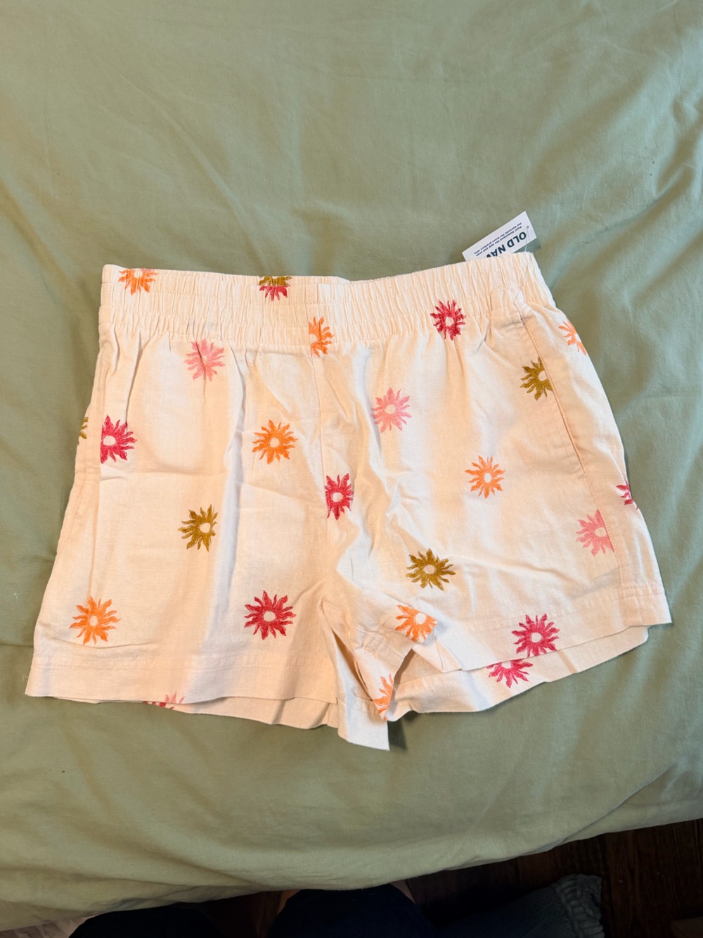Old Navy Cream Shorts with Orange and Olive Sun Motifs